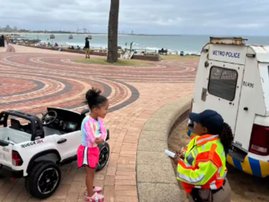 Little girl and police officer interaction