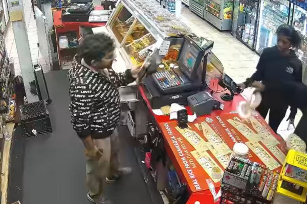 Suspects holding python in store