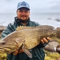 Ivan Kotze with a massive rockcod caught down South Coast