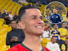 A fan who looks like Cristiano Ronaldo smiling