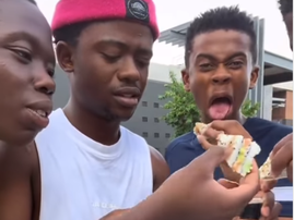 A group of guys trying sushi for the first time