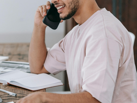 A man speaking on the phone