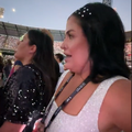 A pregnant woman at the Taylor Swift Era's concert