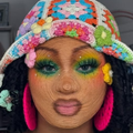 A woman with yarn stuck to her face