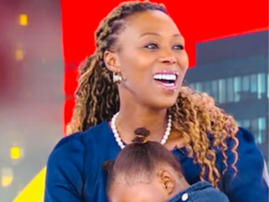 Brenda Ngxoli sitting with her daughter in a live interview