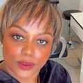 Carol Ofori with highlighted short hair at the salon