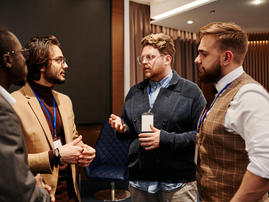 Men having a discussion at a function