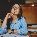 SMART_WOMAN_SITTING_AND_THINKING